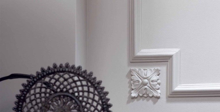 elegant architectural details; decorative rosette and wall paneling